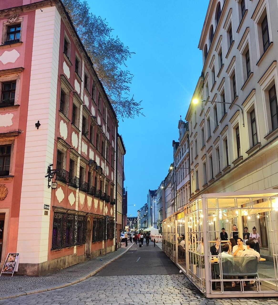 Odrzanska street, leading out from the market square and filled with great places to get food, drinks, or views. One of the 3 coolest streets in Wrocław.